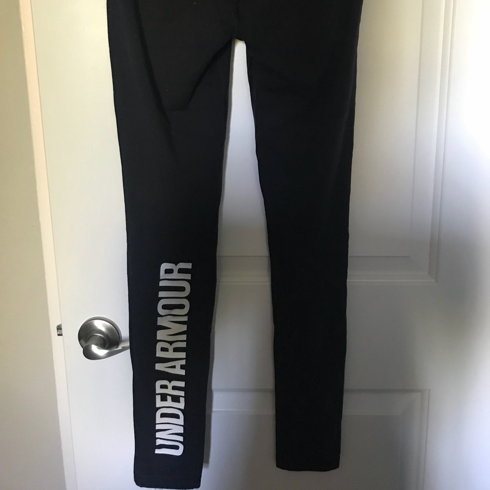 Under Armour leggings with branding on calf